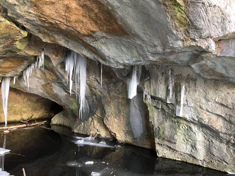 The icy landscape surrounding the caves