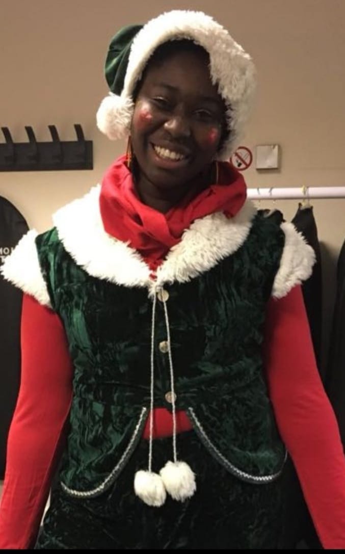 A rare photo of Lateefah in her Christmas elf costume