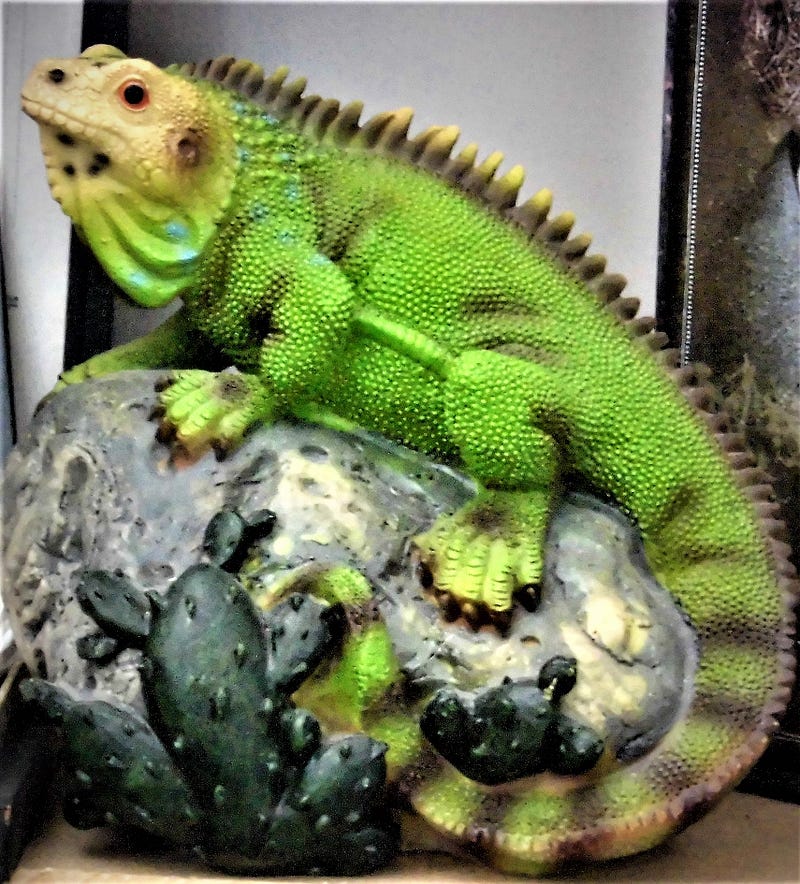 A marine iguana figurine representing the Galapagos Islands