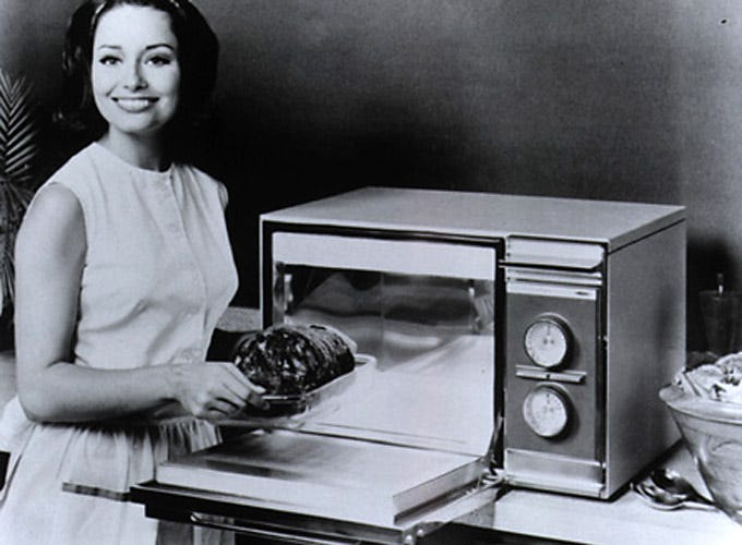 Promotional image for the first countertop microwave oven