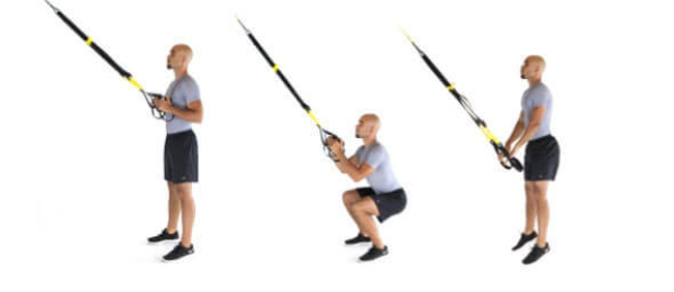 Executing jump squats with TRX